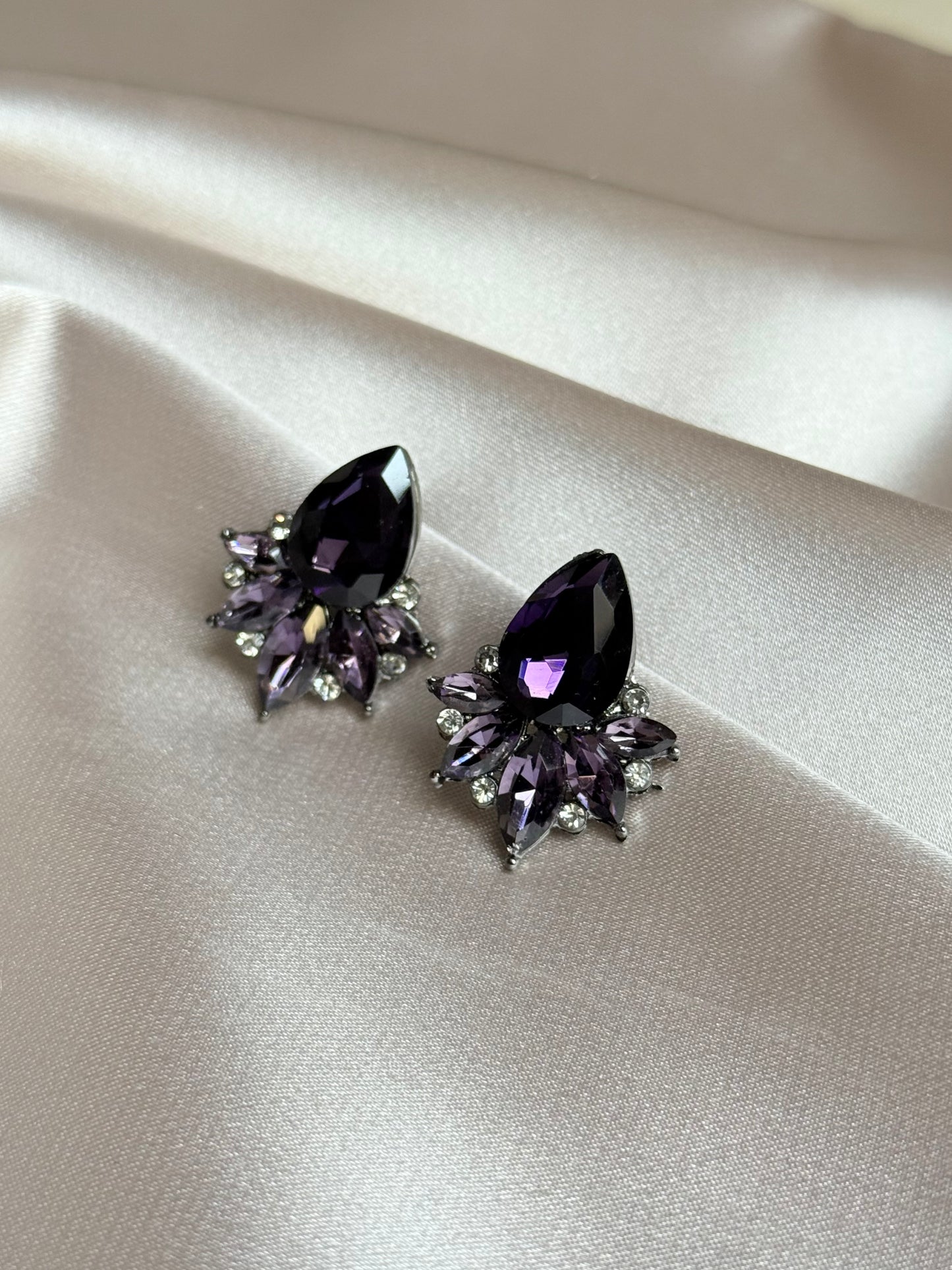 Purple zirconia stud earrings